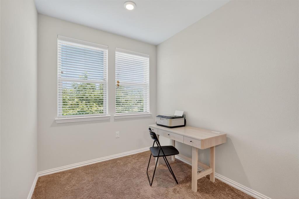 651 Watters Road, Unit 5305 Allen, TX 75013 - Photo 16 of 40 a view of a workspace with furniture and a window