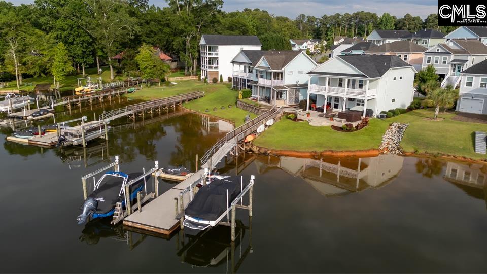 357 Cabana Way Lexington, SC 29072 - Photo 24 of 25 an aerial view of a house with swimming pool and large trees