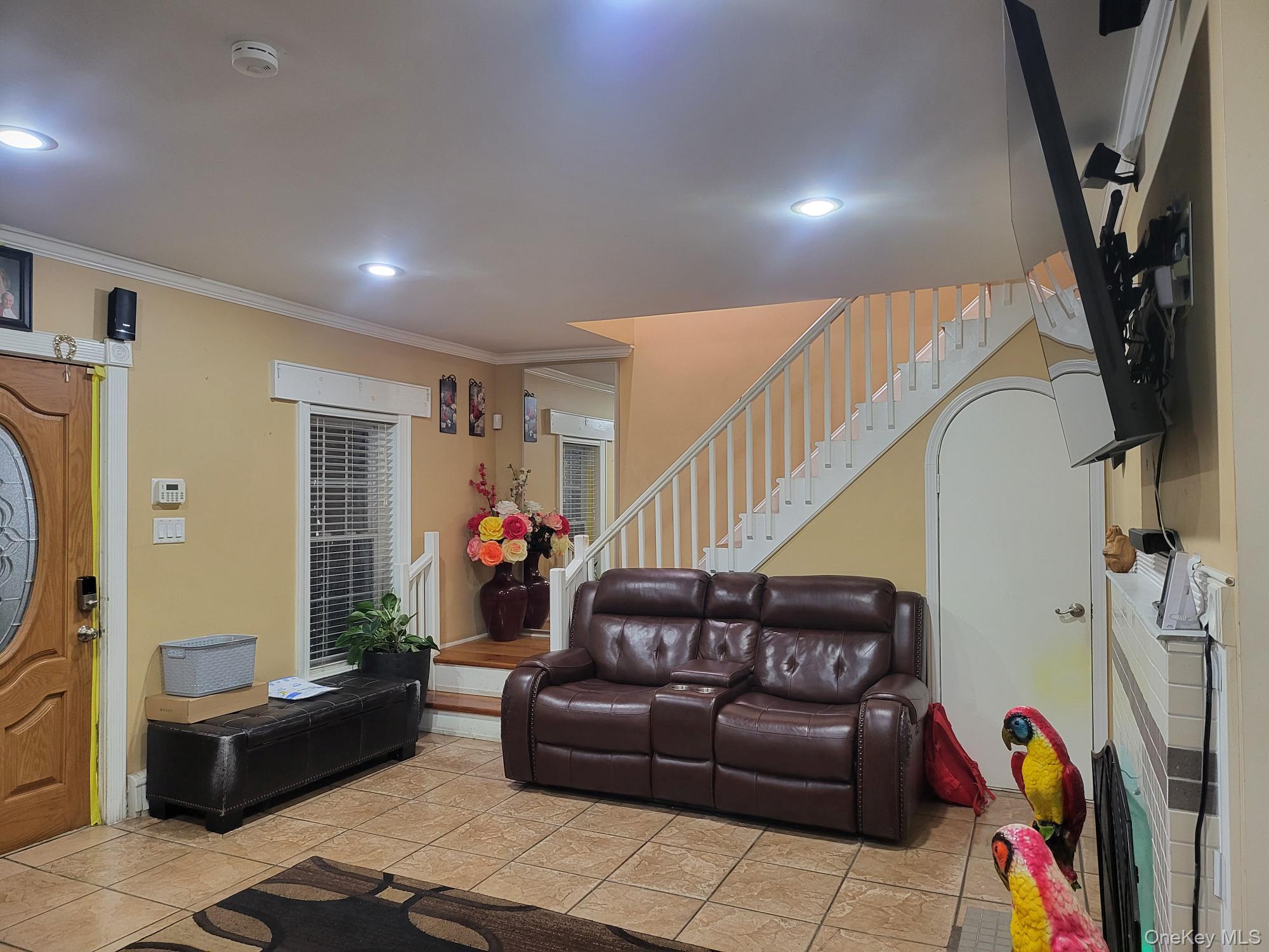 61 Wheeler Road Central Islip, NY 11722 - Photo 10 of 26 a living room with furniture and a couch