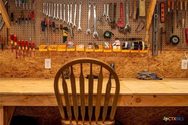 a view of a swimming pool with a yard