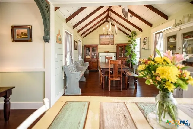 a lobby with furniture and potted plant