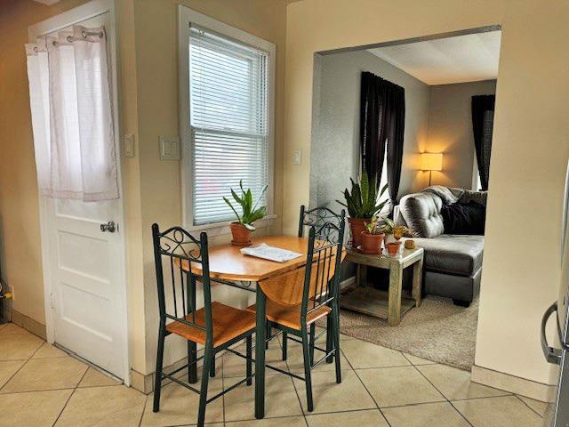 557-28 28 3/4 Road Grand Junction, CO 81501 - Photo 7 of 19 a dining room with furniture and window