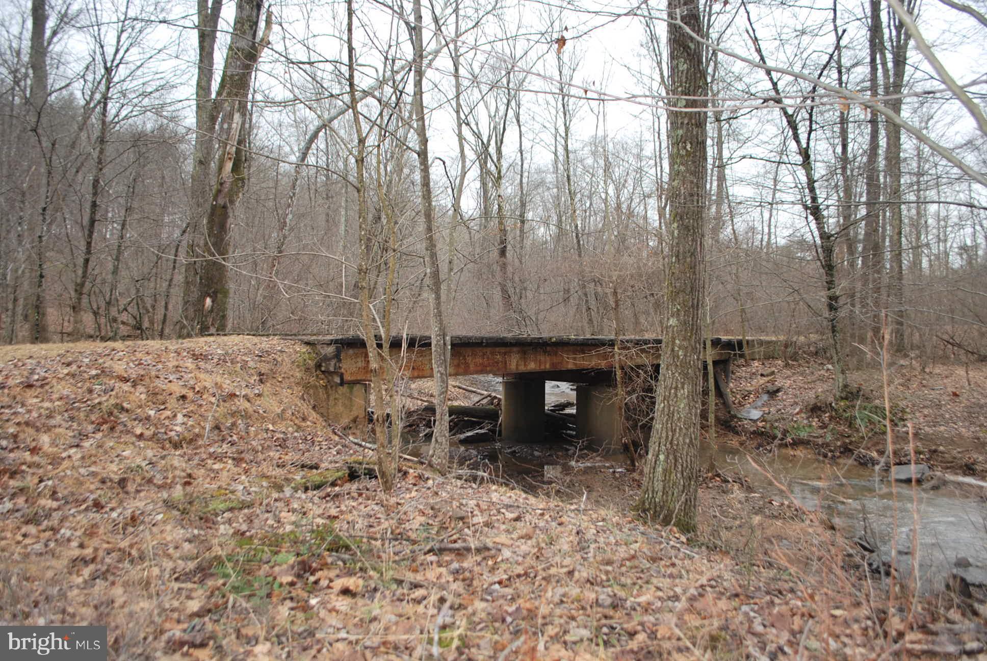 13-6 Blue Brook Road Berkeley Springs, WV 25411 - Photo 1 of 53 Sit by the creek and enjoy nature at it's finest