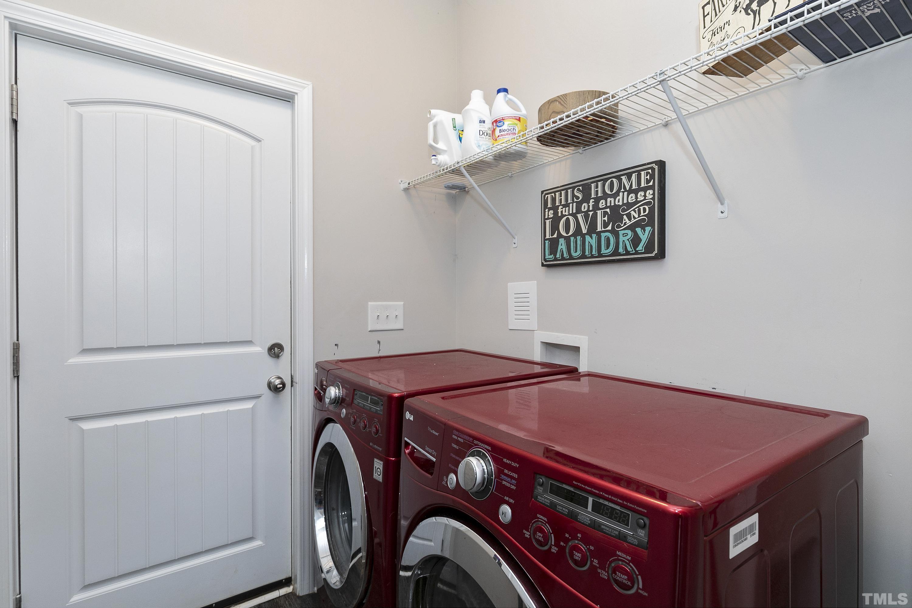 7163 Highway 210 Bunnlevel, NC 28323 - Photo 29 of 54 a utility room with dryer and washer