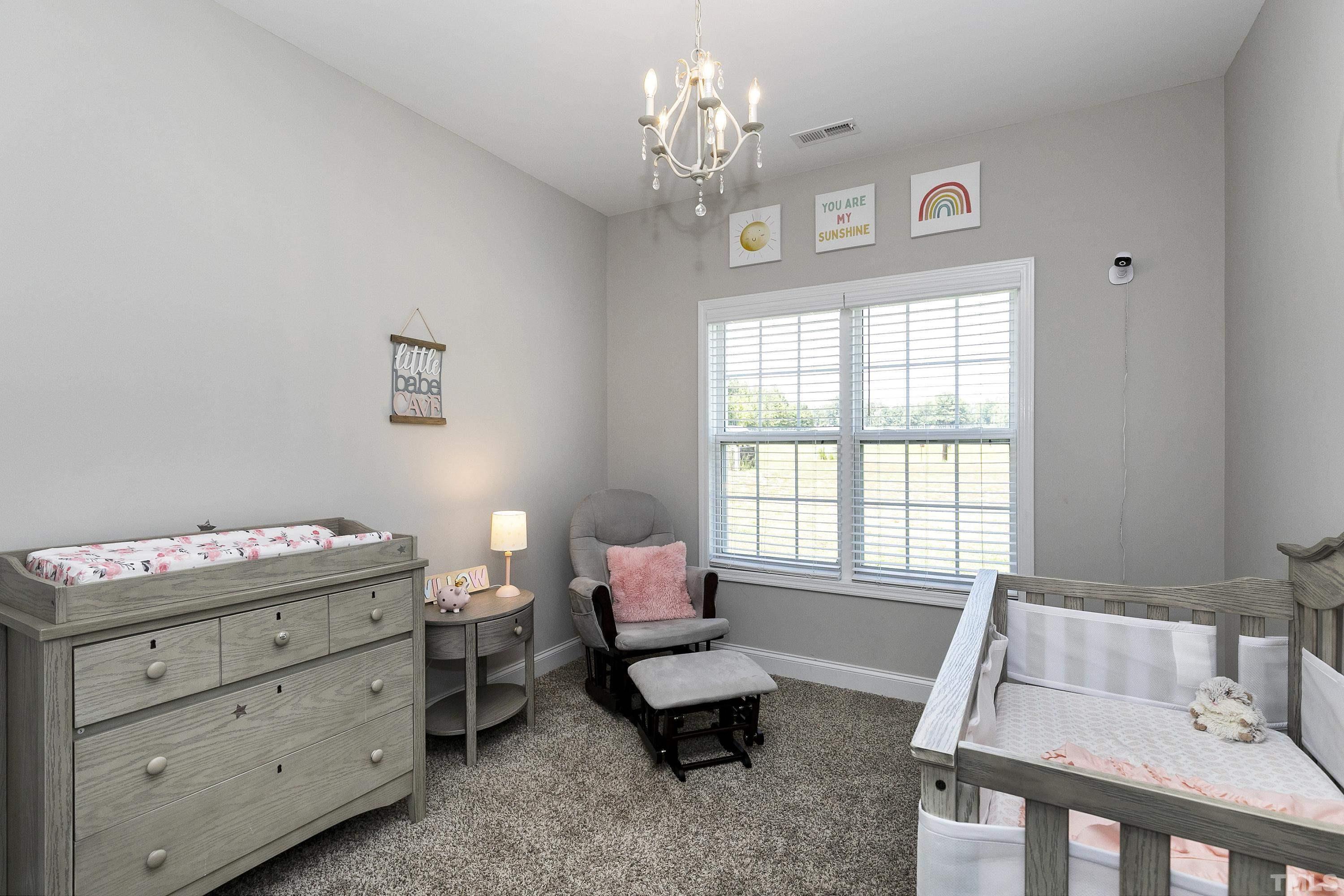 7163 Highway 210 Bunnlevel, NC 28323 - Photo 33 of 54 a living room with furniture and a window