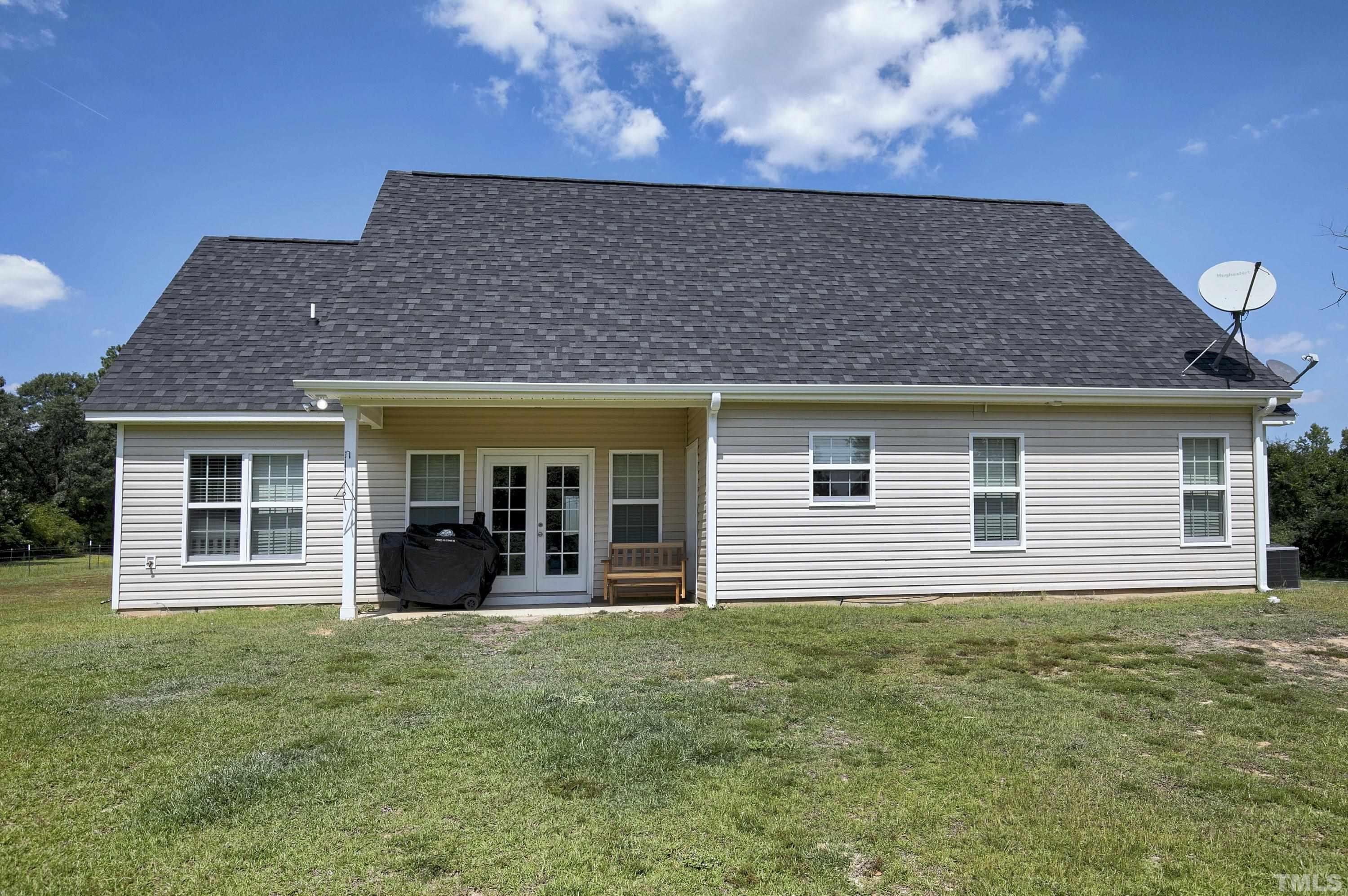 7163 Highway 210 Bunnlevel, NC 28323 - Photo 39 of 54 a house view with a garden space