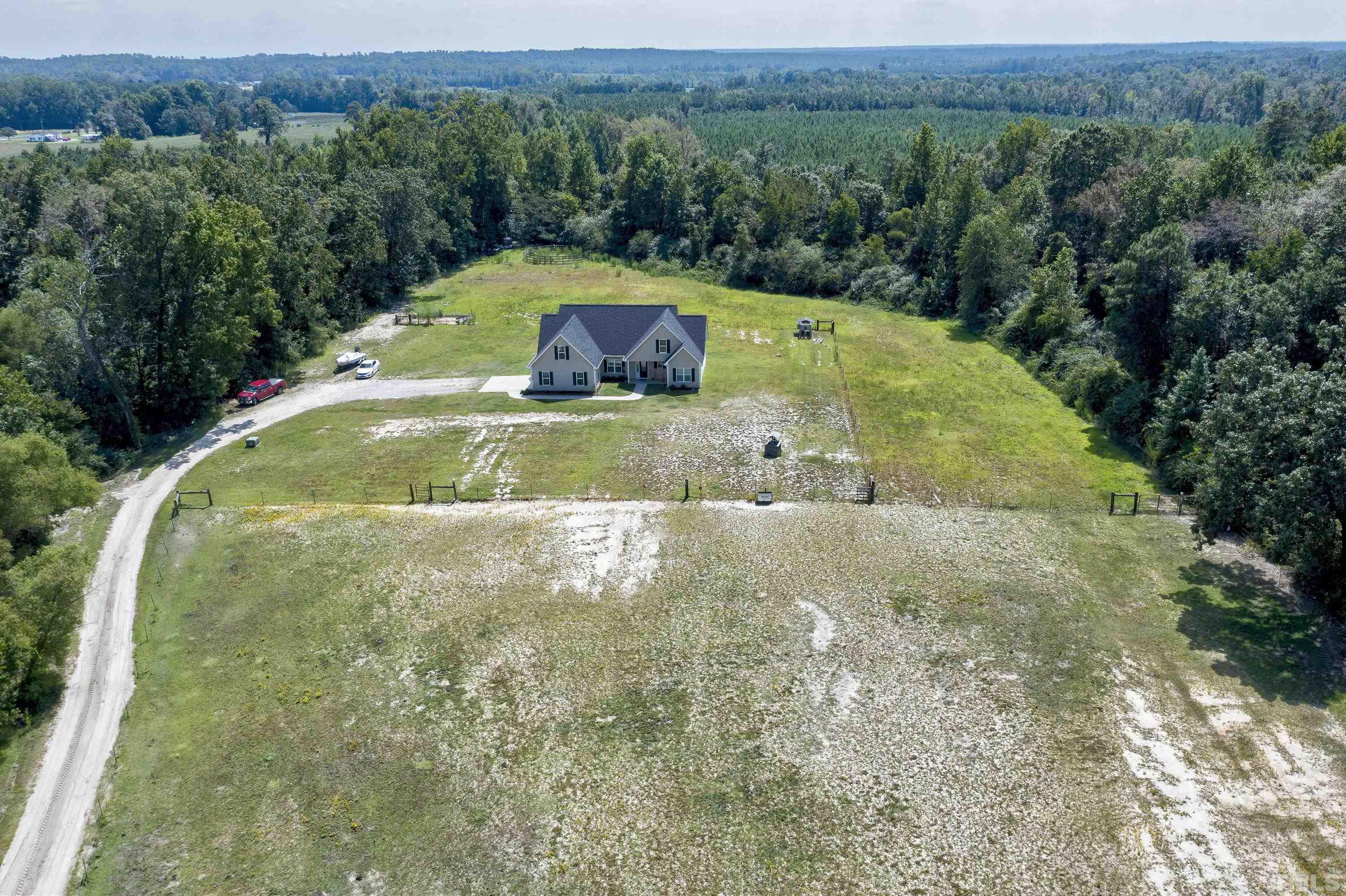 7163 Highway 210 Bunnlevel, NC 28323 - Photo 47 of 54 a view of a swimming pool with a yard