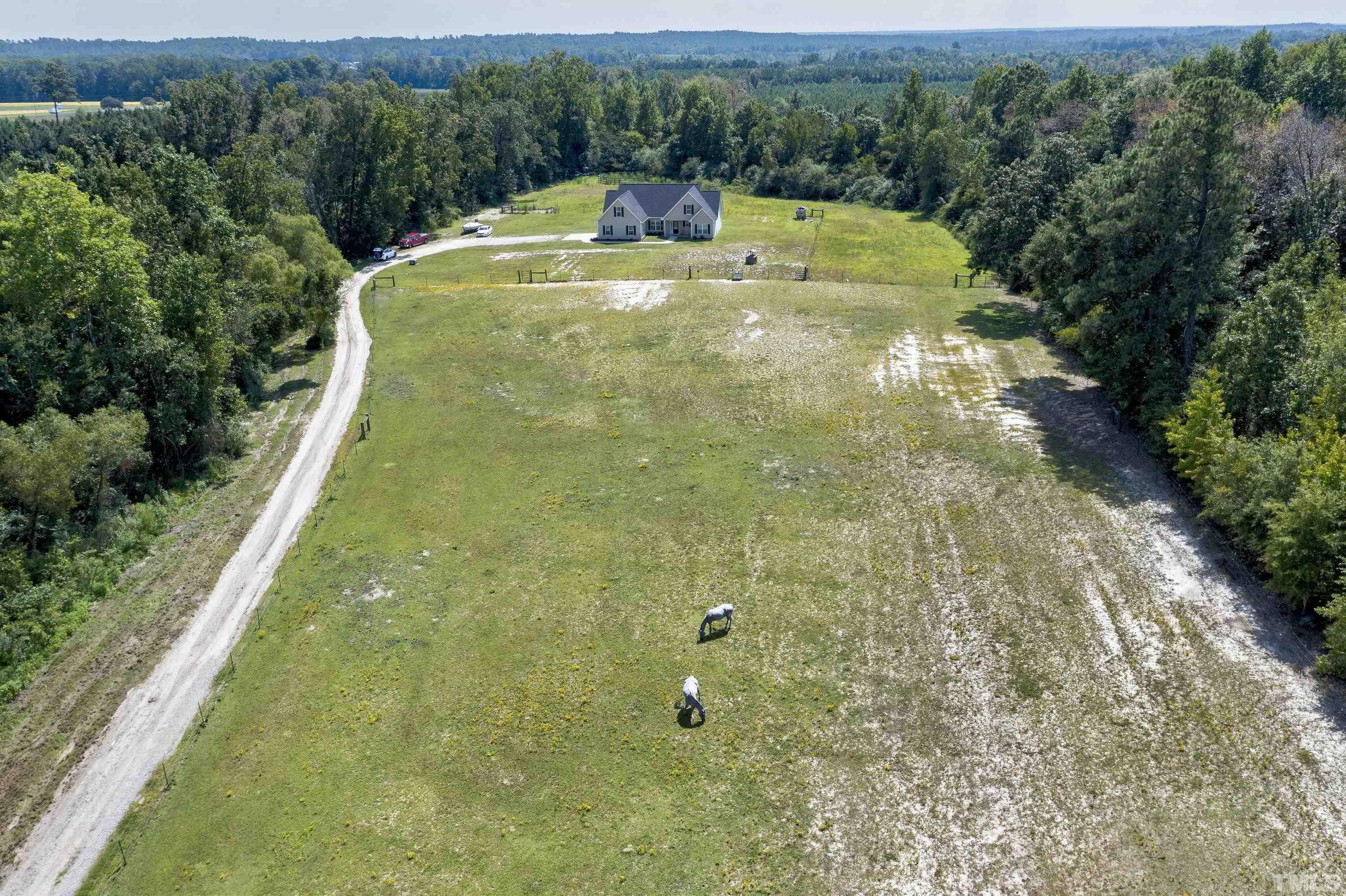 7163 Highway 210 Bunnlevel, NC 28323 - Photo 48 of 54 a view of a swimming pool with a yard