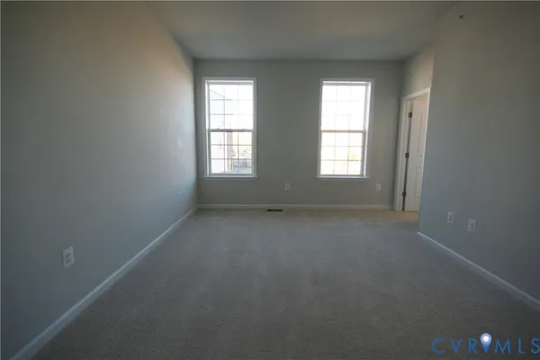 an empty room that has a window
