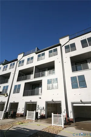 a front view of a building with glass windows