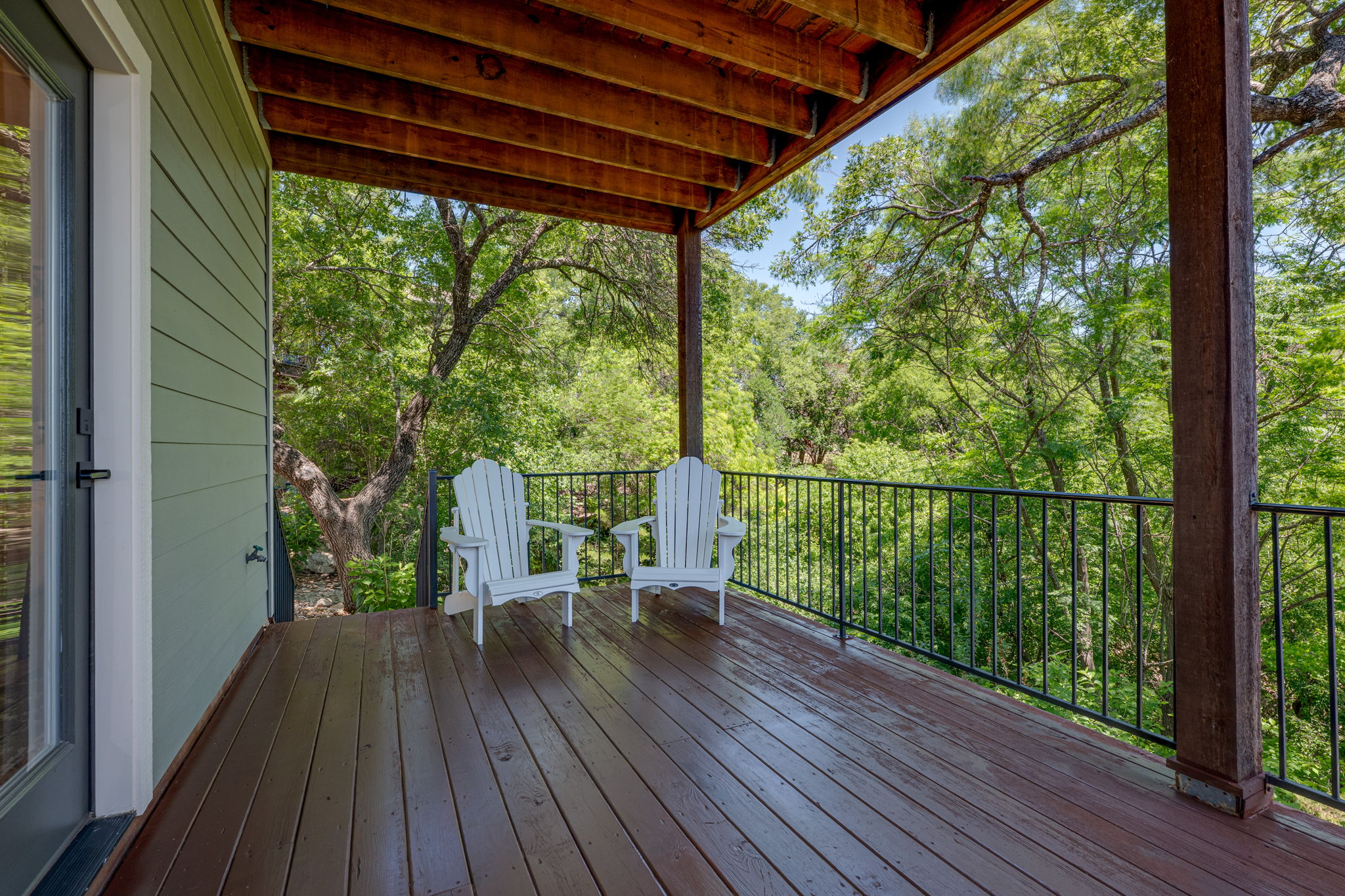 433 Venture Boulevard South Point Venture, TX 78645 - Photo 25 of 36 The decks are the whole mood: quiet, dramatic, and impossible to rush.