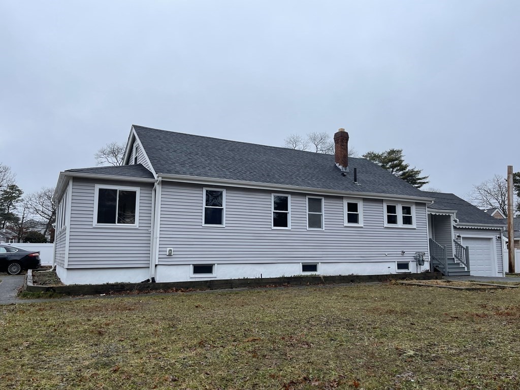 87 Cohasset Road Wareham, MA 02532 - Photo 2 of 16 a front view of a house with garden