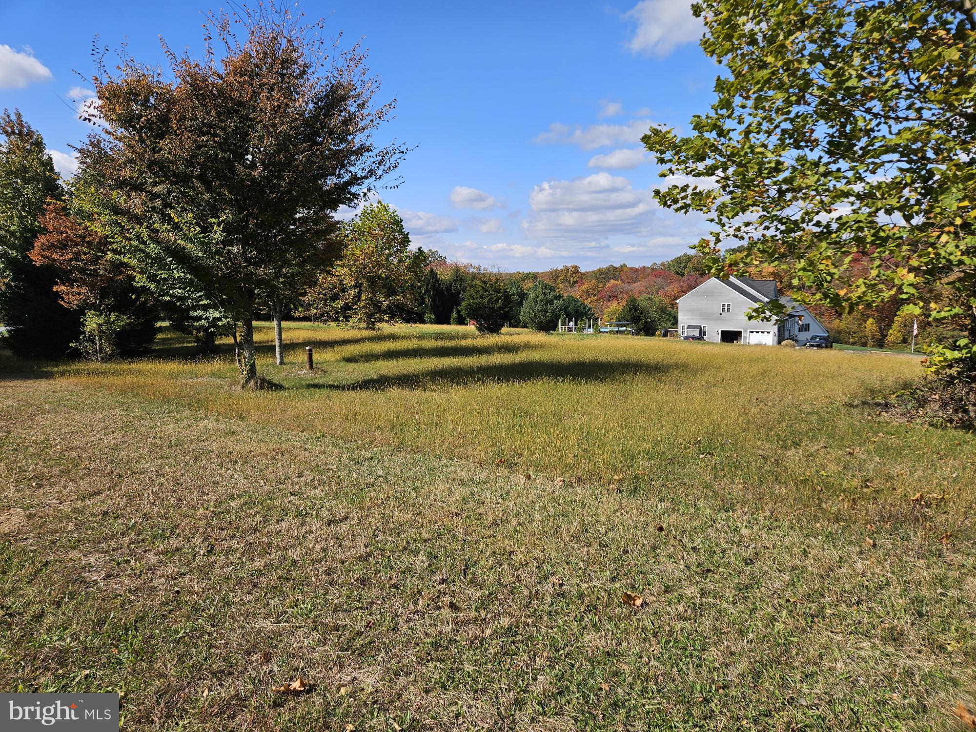 Arnold Road Westminster, MD 21157 - Photo 6 of 12 a view of a lake with houses in the background