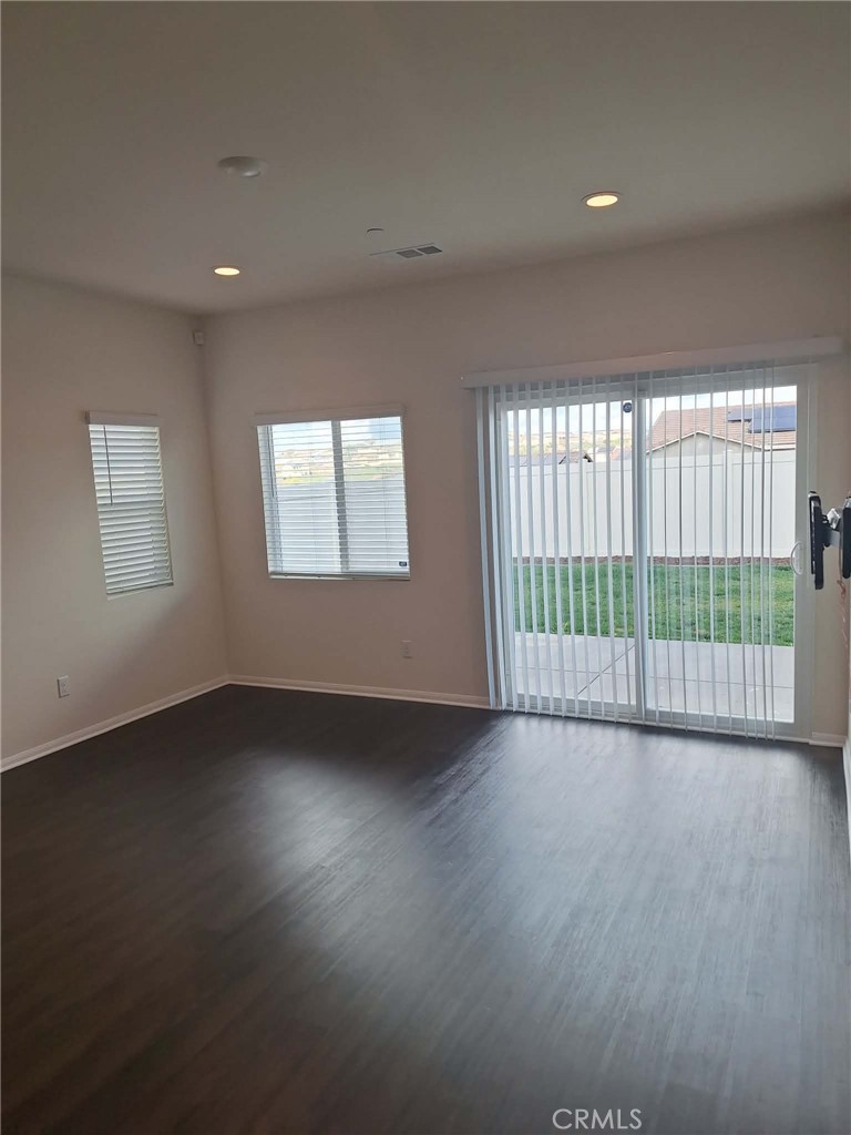 35170 Webb Place Beaumont, CA 92223 - Photo 7 of 21 a view of a room window and wooden floor