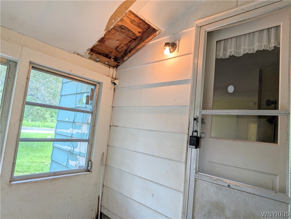 3279 Riverside Drive Scio, NY 14895 - Photo 33 of 48 Ceiling and roof damage in the breezeway
