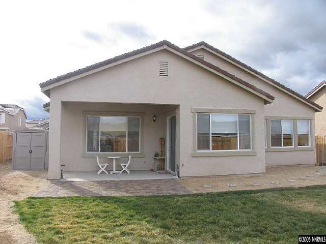 2595 Perryville Drive Reno, NV 89521 - Photo 8 of 9 a front view of a house with a yard