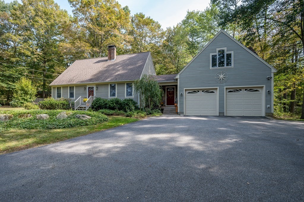 152 Warren Road Brimfield, MA 01010 - Photo 2 of 33 a front view of a house with a garden