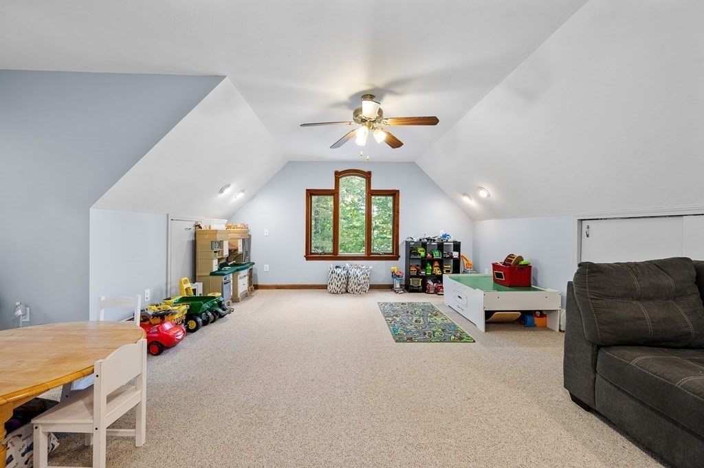152 Warren Road Brimfield, MA 01010 - Photo 24 of 33 a living room with furniture flowerpot and a window