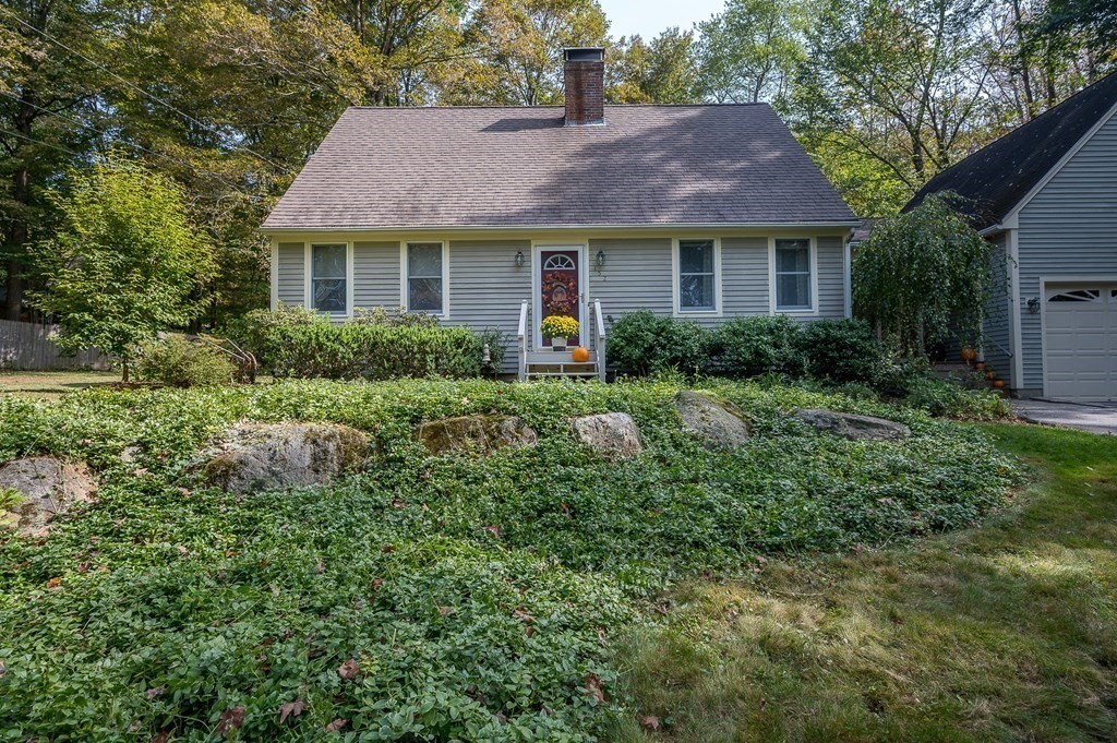 152 Warren Road Brimfield, MA 01010 - Photo 28 of 33 a front view of a house with a yard and outdoor seating