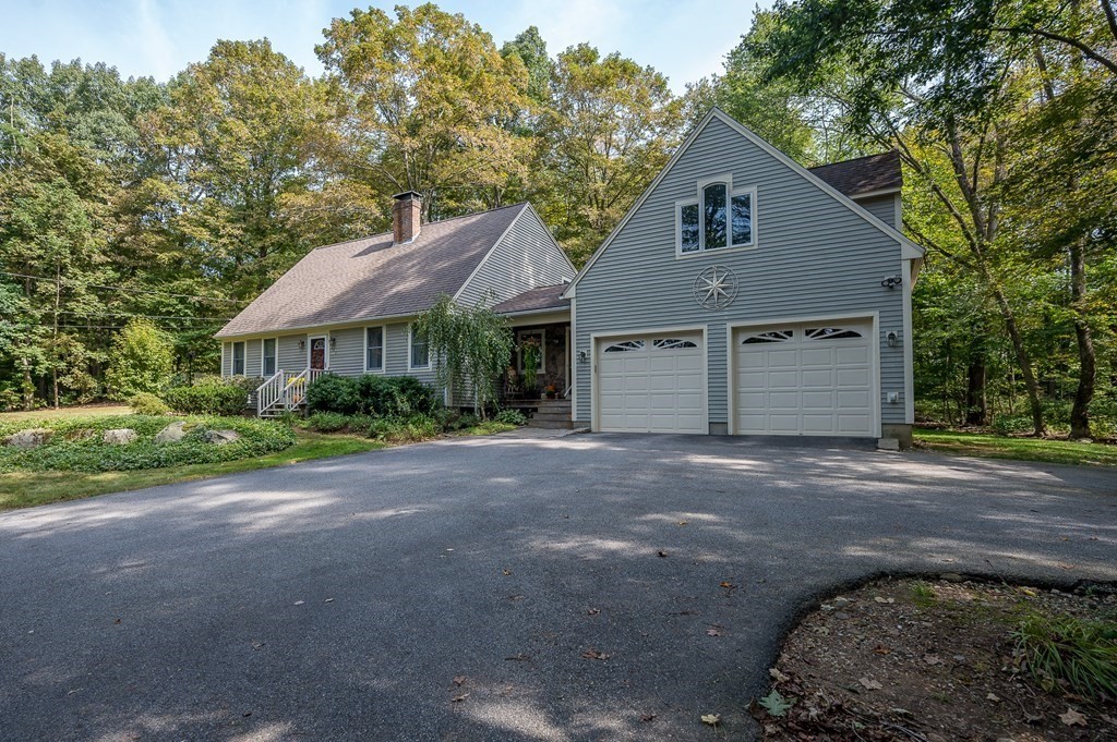 152 Warren Road Brimfield, MA 01010 - Photo 29 of 33 a front view of a house with a garden and yard