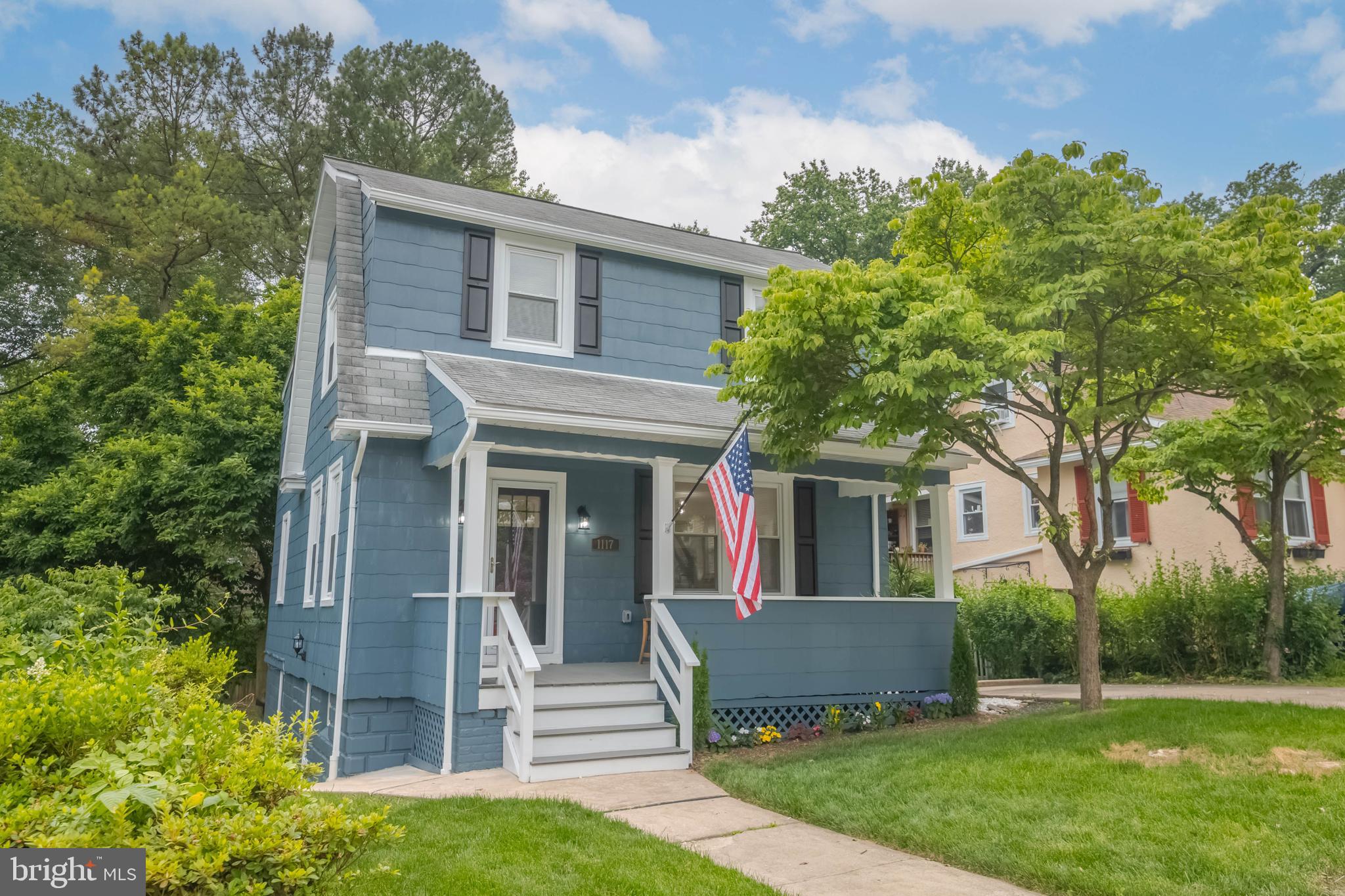 1117 Overbrook Road Baltimore, MD 21239 - Photo 2 of 37 front view of a house with a yard