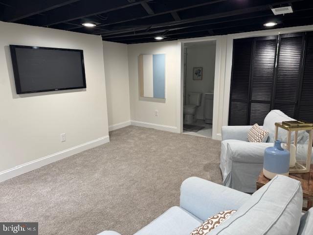 1117 Overbrook Road Baltimore, MD 21239 - Photo 25 of 37 a living room with furniture and a flat screen tv