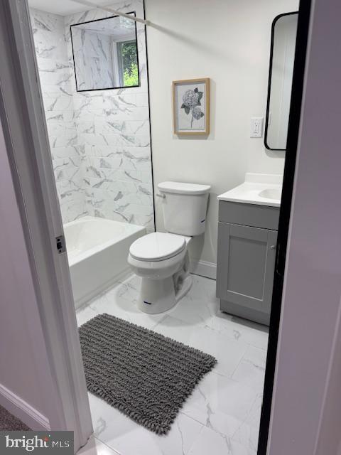 1117 Overbrook Road Baltimore, MD 21239 - Photo 28 of 37 a bathroom with a toilet and a shower