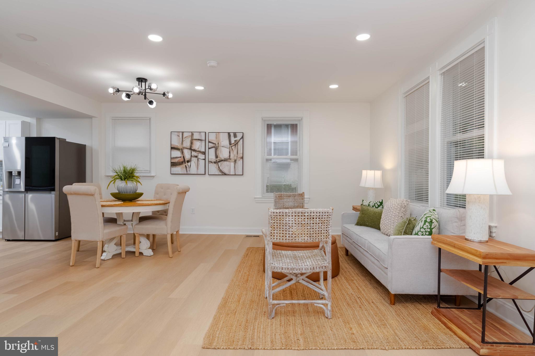 1117 Overbrook Road Baltimore, MD 21239 - Photo 6 of 37 a living room with furniture and a flat screen tv