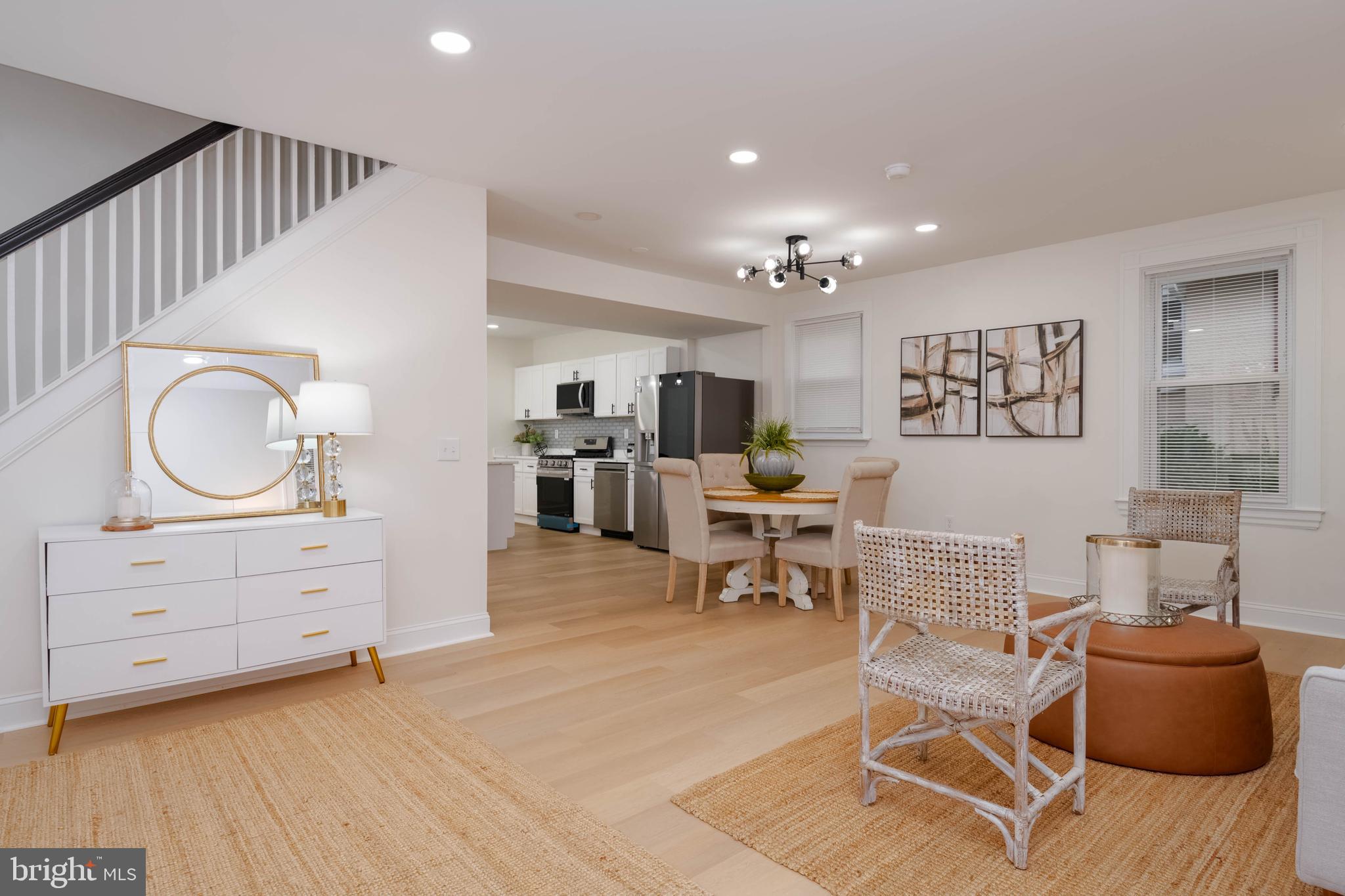 1117 Overbrook Road Baltimore, MD 21239 - Photo 7 of 37 a living room with furniture and view of kitchen