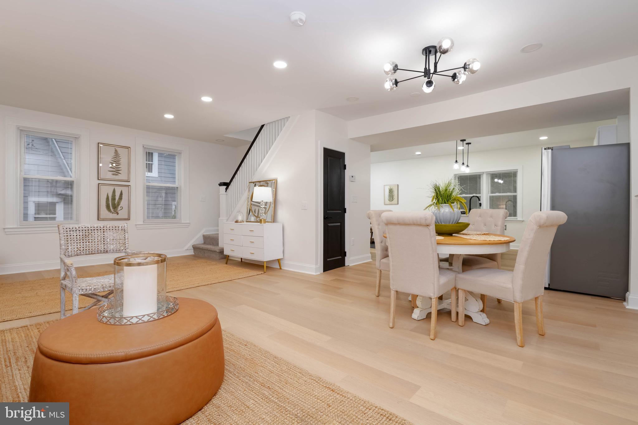 1117 Overbrook Road Baltimore, MD 21239 - Photo 9 of 37 a living room with furniture and wooden floor