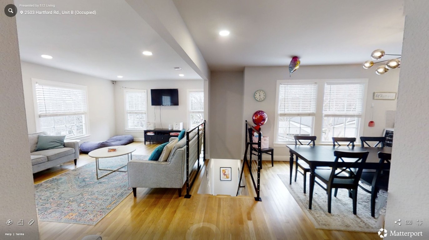 2503 Hartford Road, Unit B Austin, TX 78703 - Photo 1 of 14 Living room with light wood-style floors, recessed lighting, and a chandelier