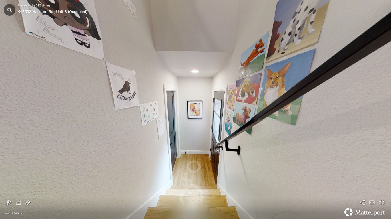 2503 Hartford Road, Unit B Austin, TX 78703 - Photo 11 of 14 Hall featuring light wood-style floors, a textured wall, and recessed lighting