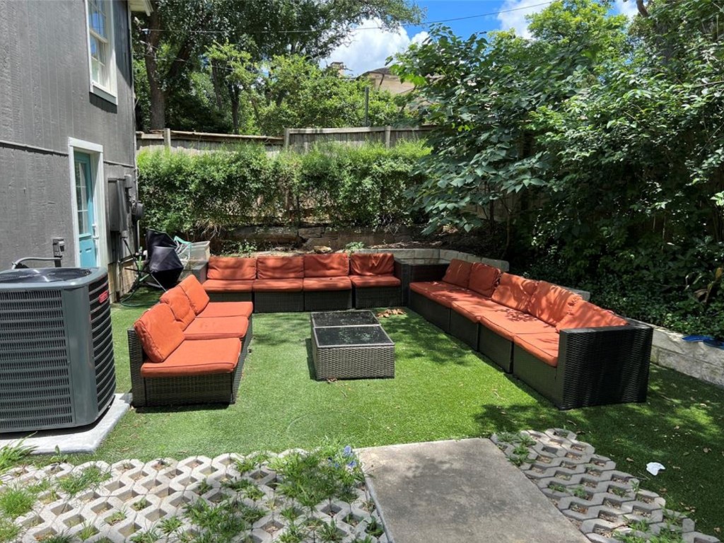 2503 Hartford Road, Unit B Austin, TX 78703 - Photo 13 of 14 Fenced backyard featuring outdoor lounge area and a patio area