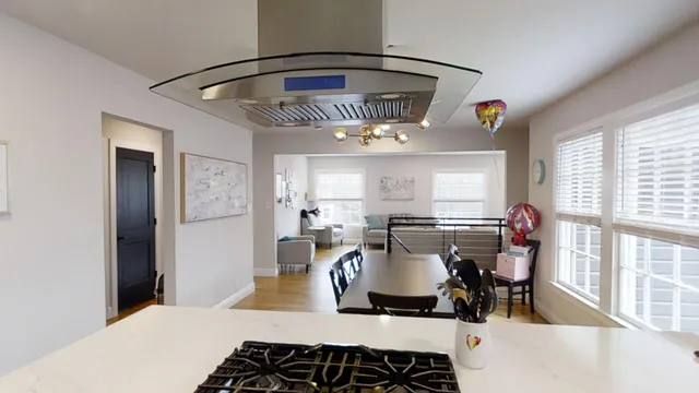 a view of a dining room with furniture window and outside view