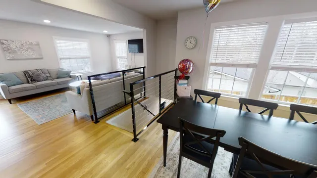a view of a livingroom with furniture and a table