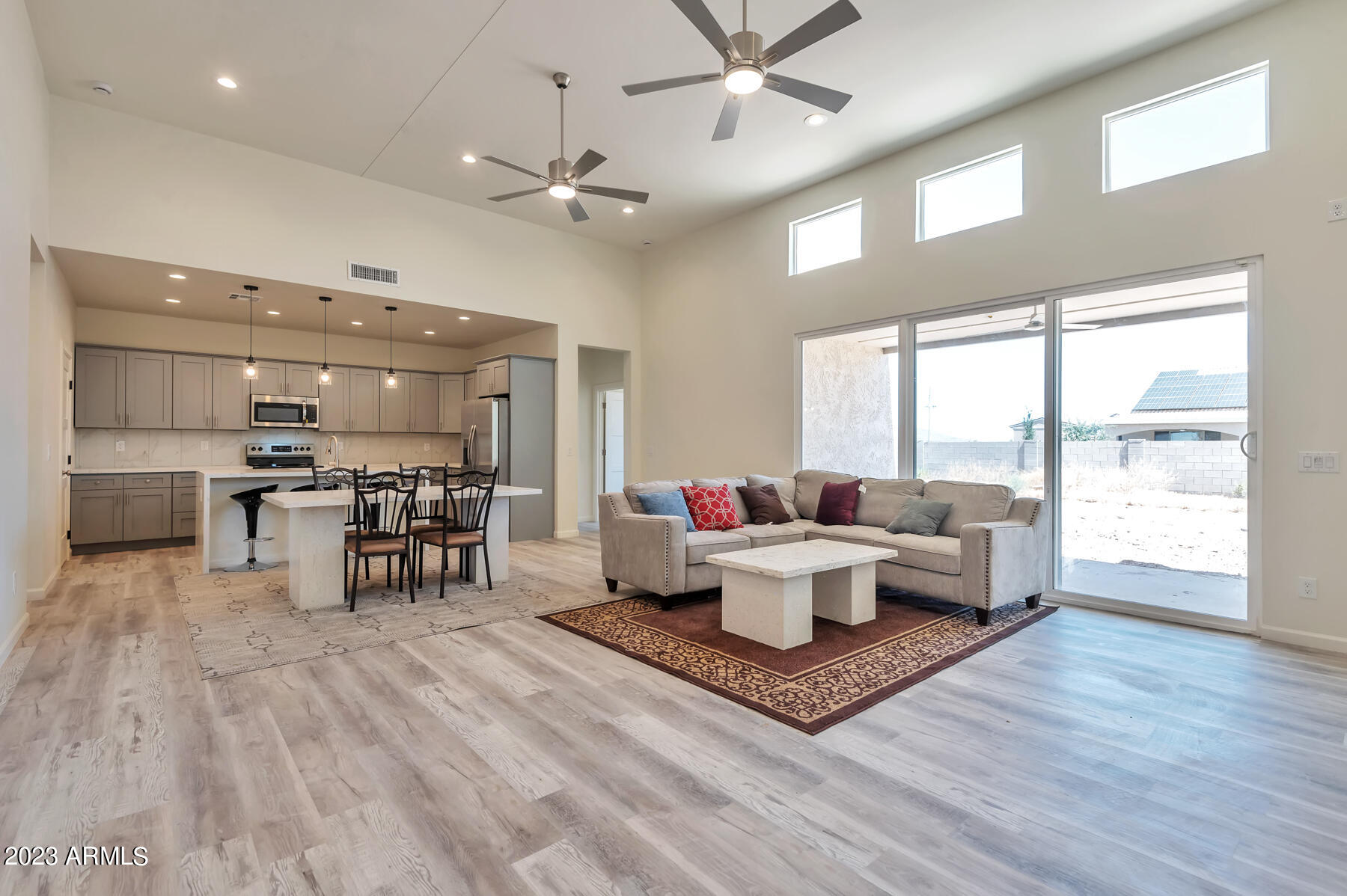 15200 South Diablo Road Arizona City, AZ 85123 - Photo 13 of 23 a living room with furniture a table and chairs