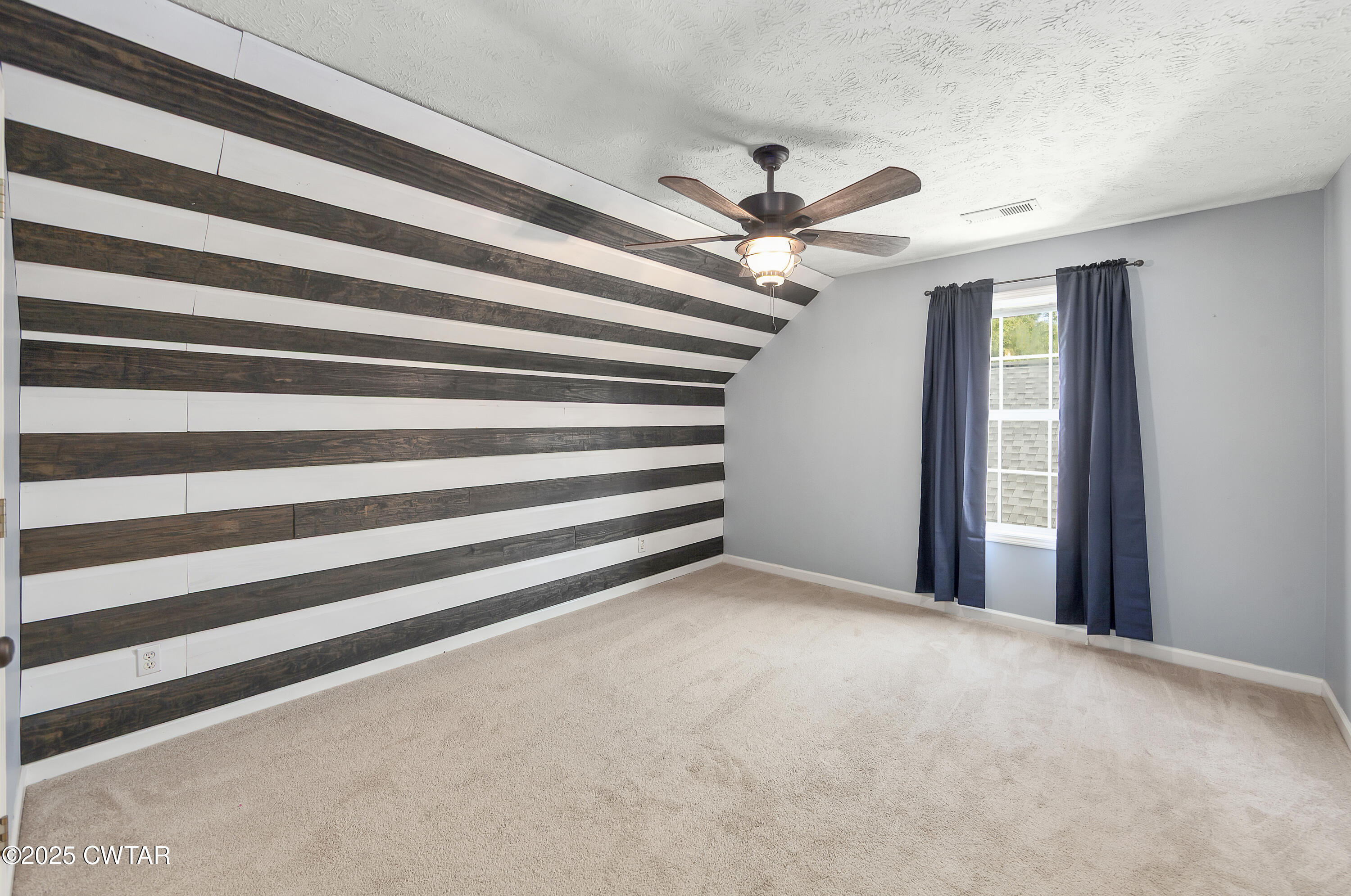 175 Willow Branch Drive Jackson, TN 38305 - Photo 27 of 39 a view of an empty room with a window