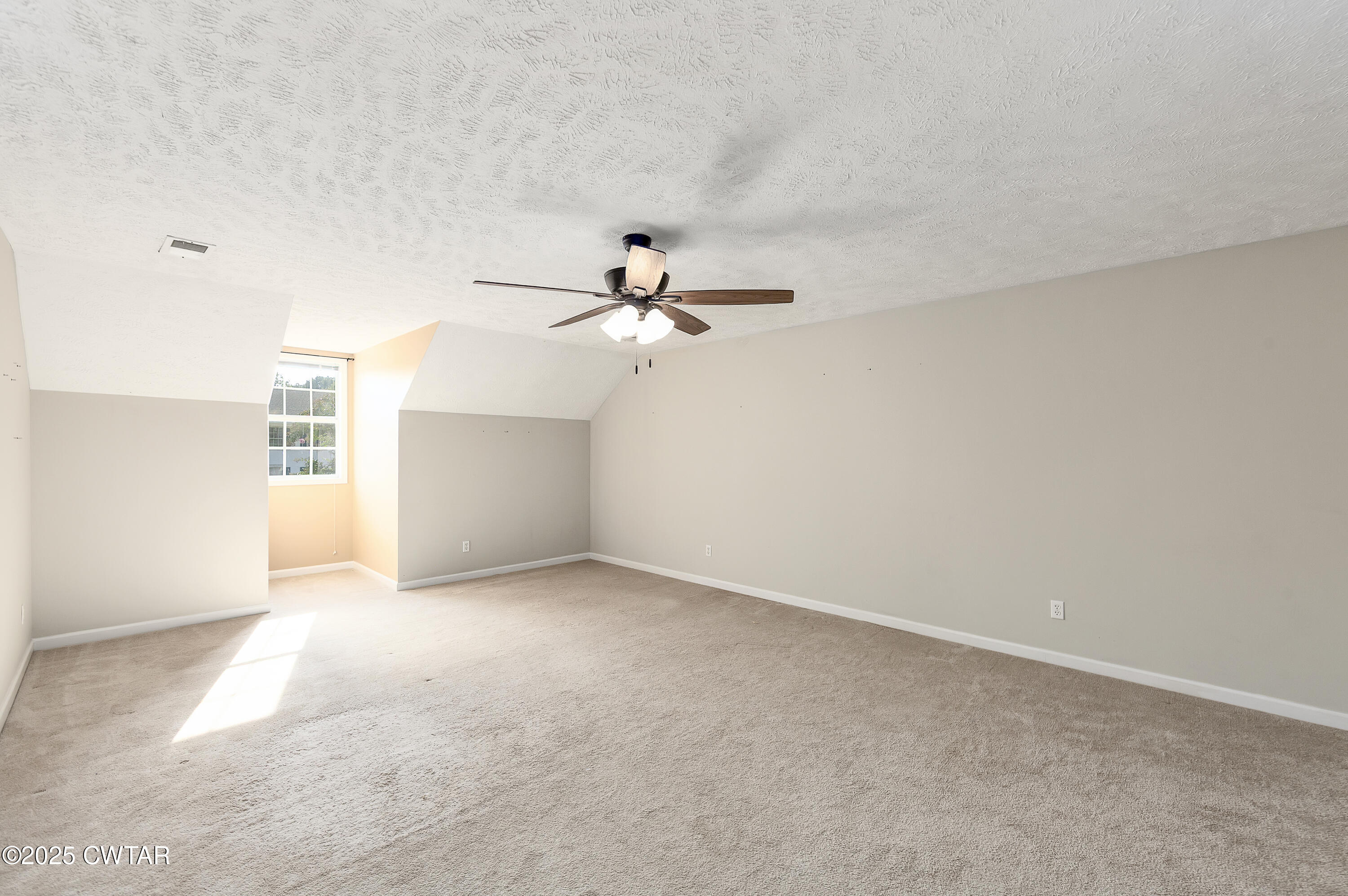 175 Willow Branch Drive Jackson, TN 38305 - Photo 29 of 39 a view of a ceiling fan in a room