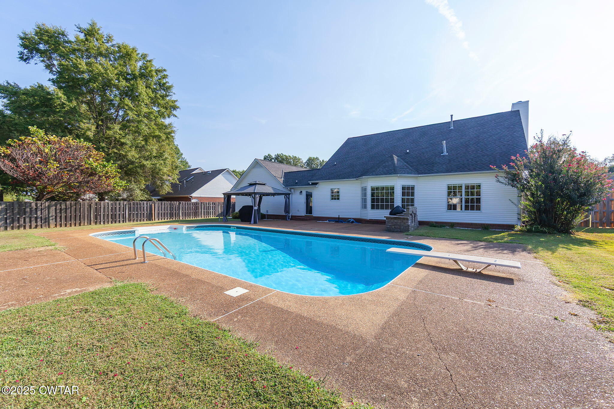 175 Willow Branch Drive Jackson, TN 38305 - Photo 36 of 39 a view of a swimming pool with a lounge chairs