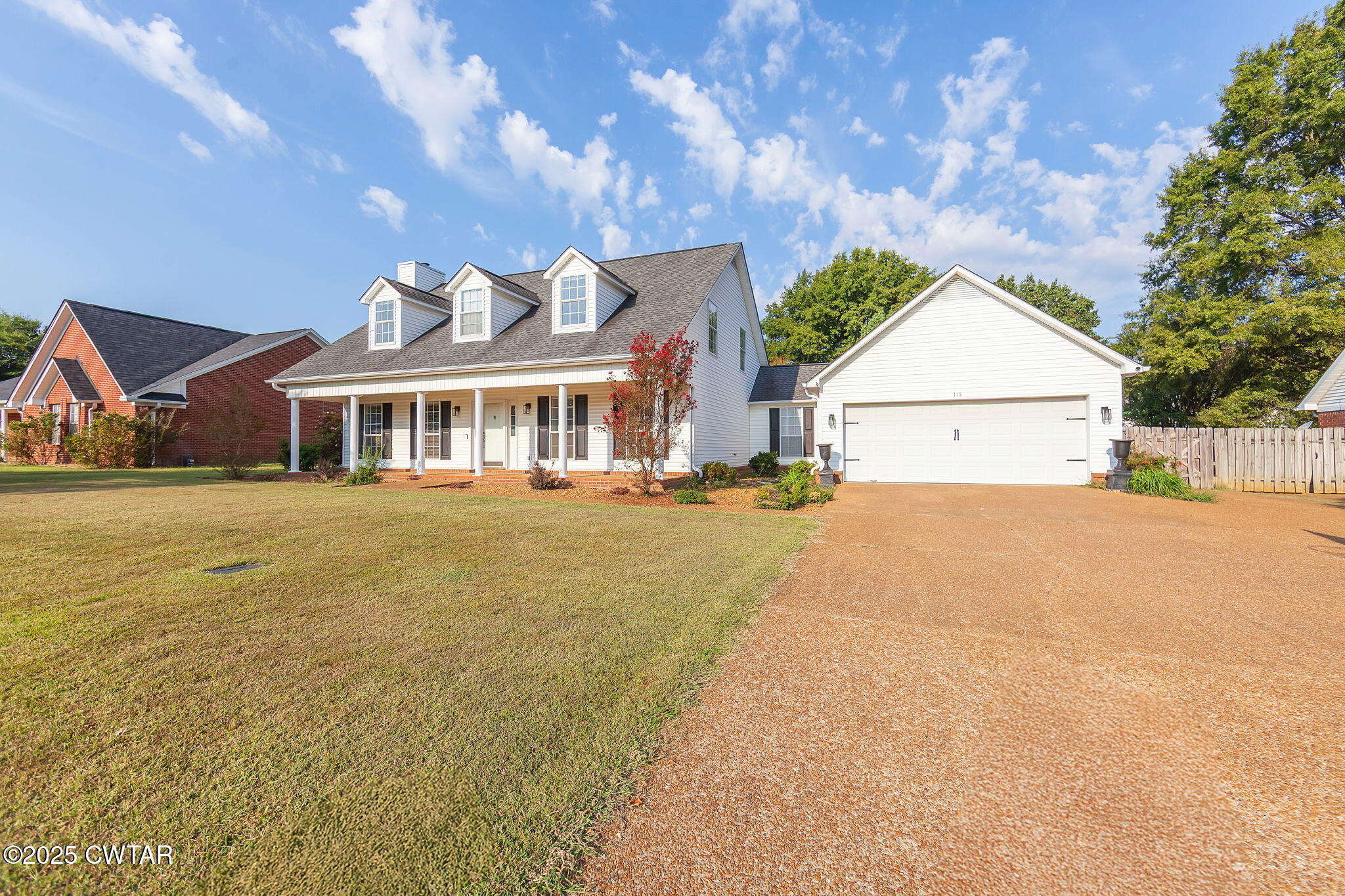 175 Willow Branch Drive Jackson, TN 38305 - Photo 39 of 39 a view of a white house with a yard