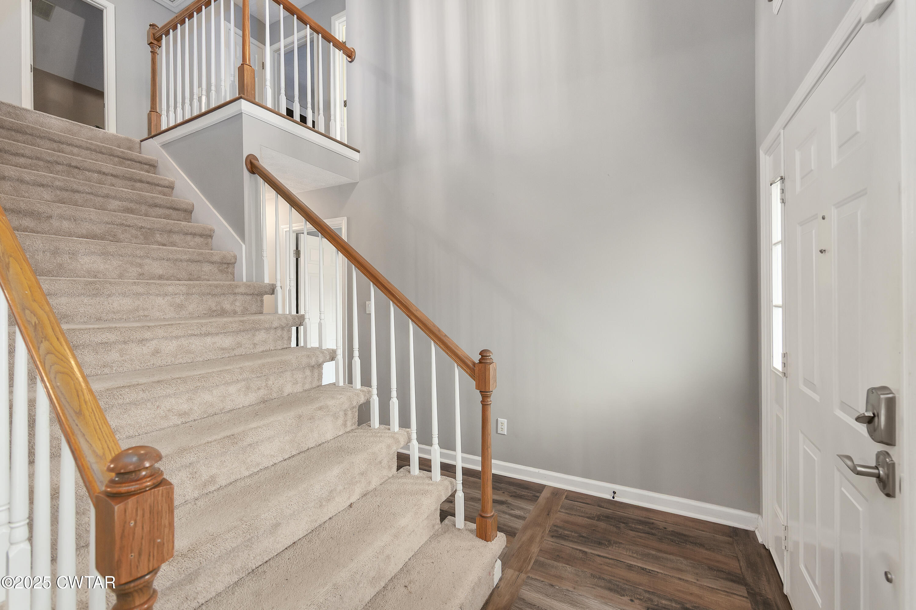 175 Willow Branch Drive Jackson, TN 38305 - Photo 4 of 39 a view of staircase with railing and white walls
