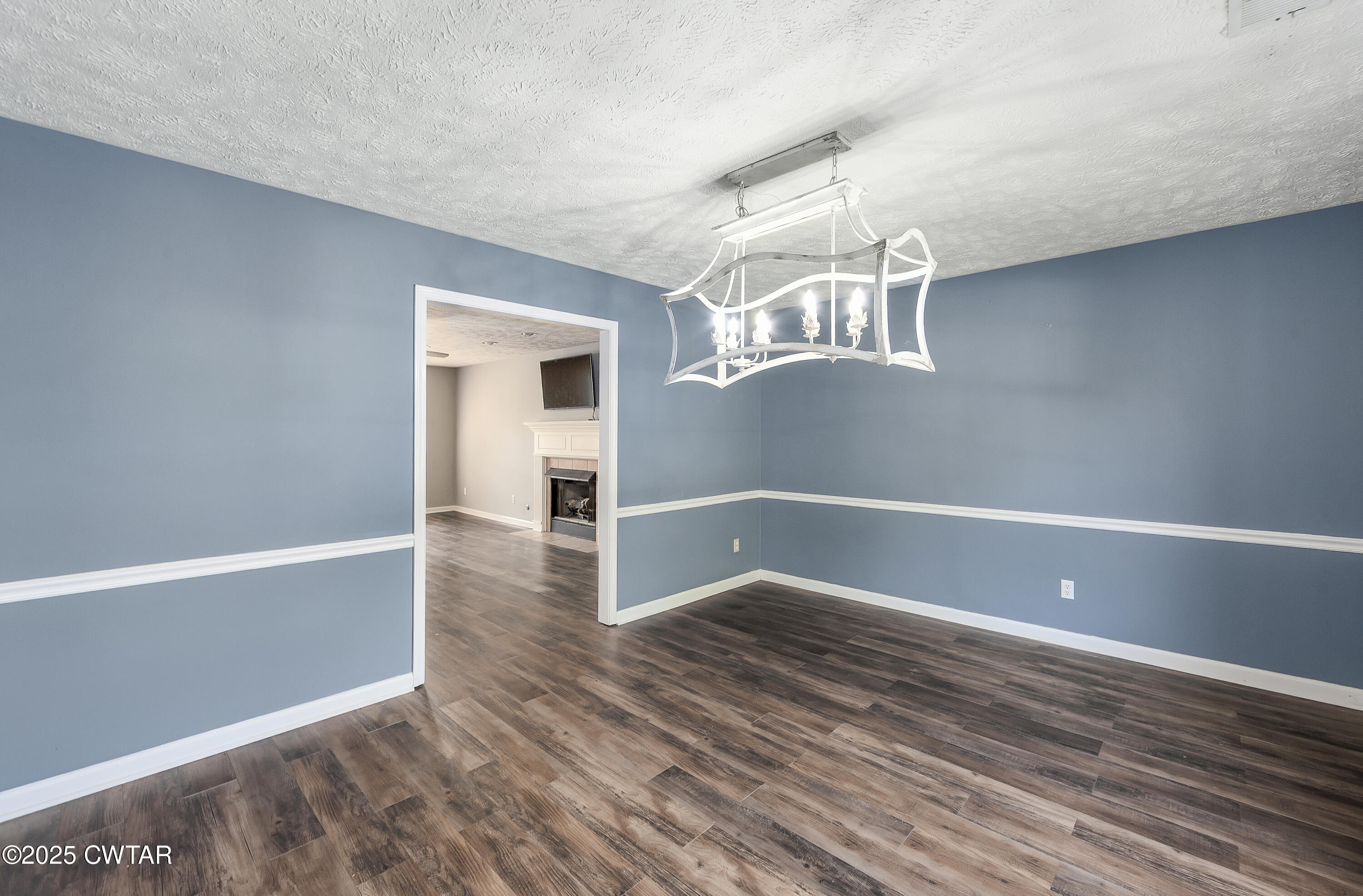 175 Willow Branch Drive Jackson, TN 38305 - Photo 10 of 39 a view of a hallway with wooden floor