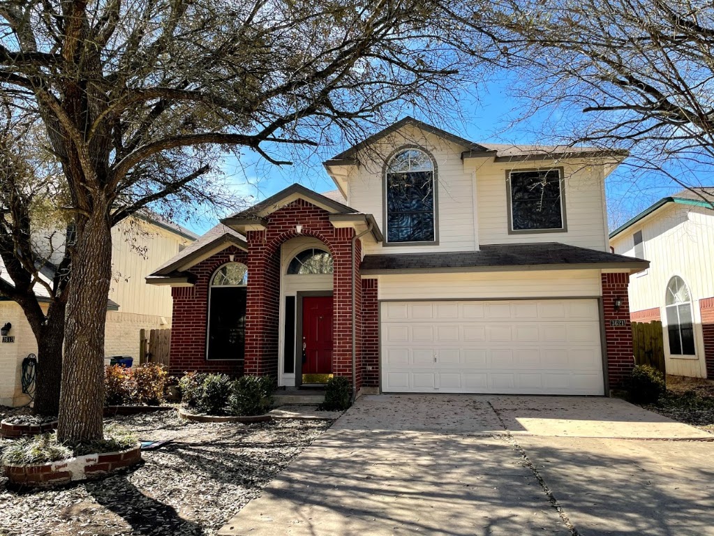 3621 Bratton Heights Drive Austin, TX 78728 - Photo 1 of 1 a front view of a house with a yard
