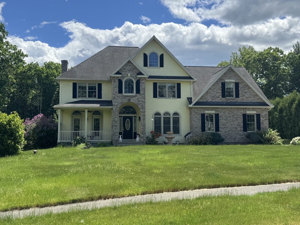 5 Gableview Lane Southwick, MA 01077 - Photo 4 of 41 a front view of a house with a yard