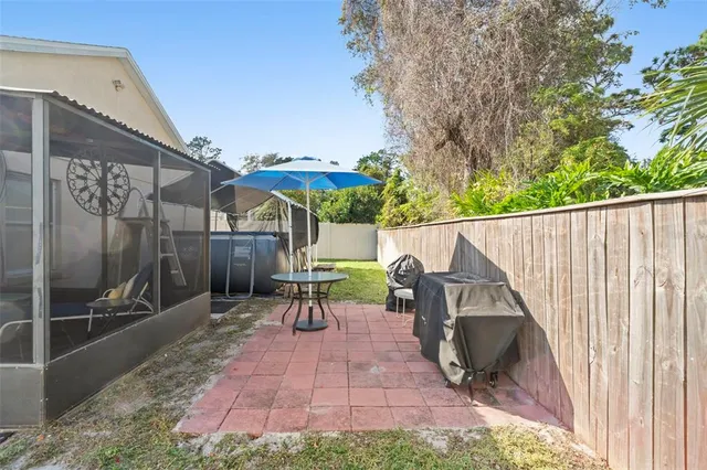 a view of swimming pool with a yard