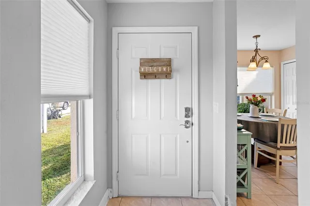 a kitchen with cabinets appliances and a counter space