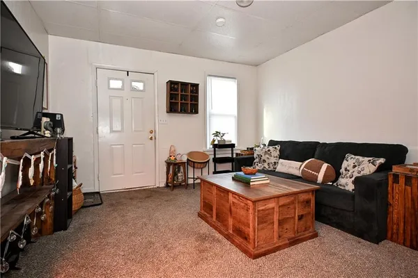 a view of a storage & utility room with two washing machine