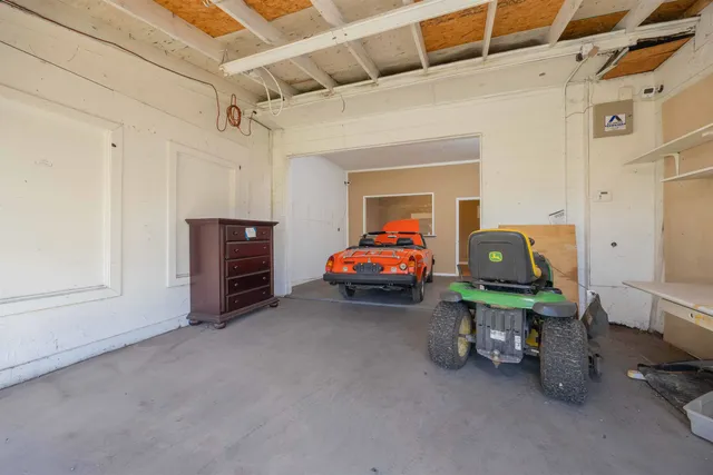 a view of street with parked cars