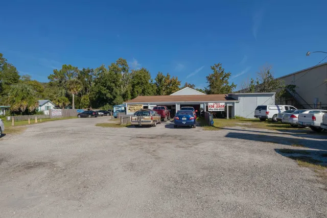 a view of street with parked cars