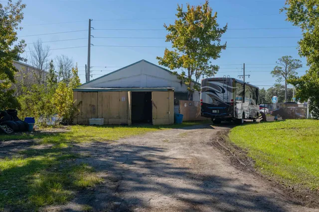 a view of a yard with an trees